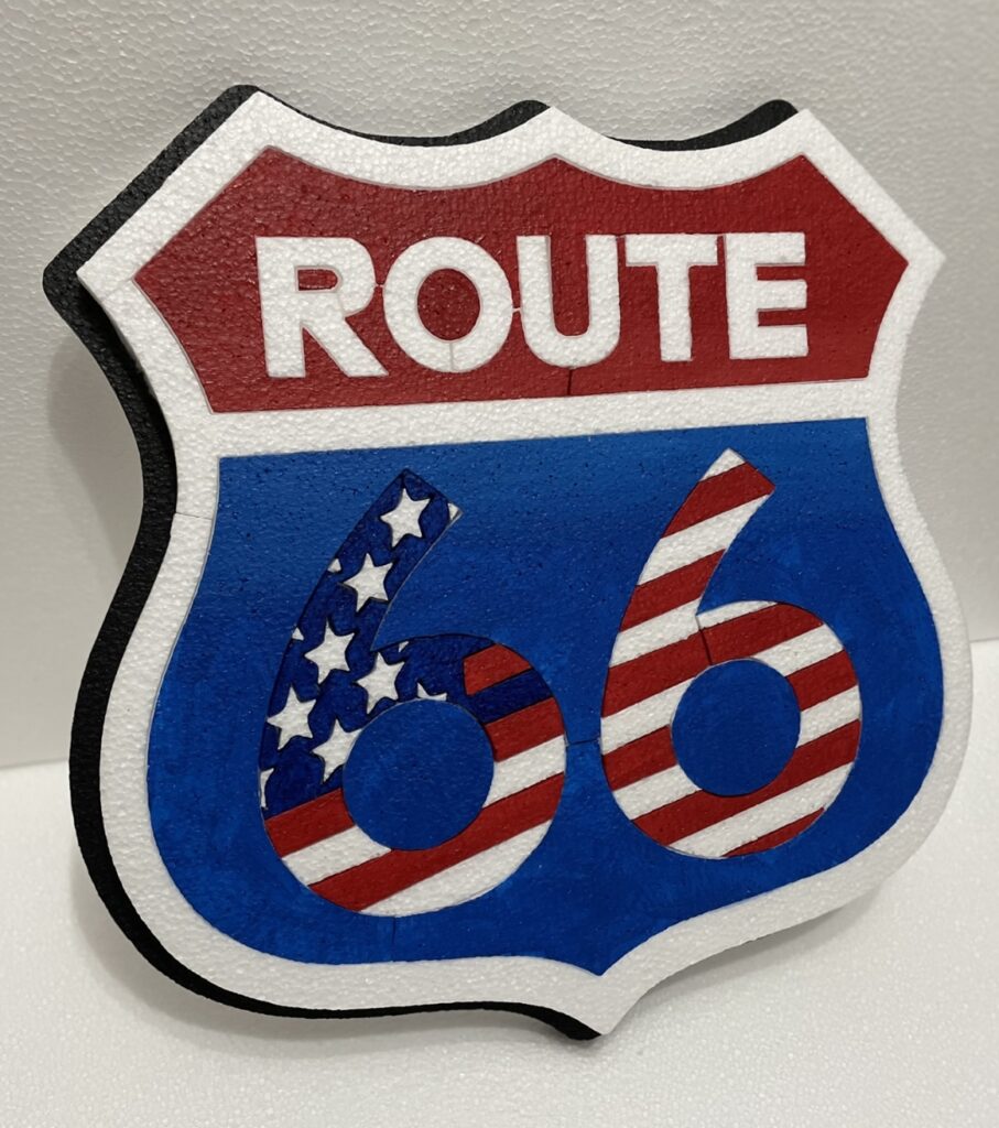 Logo mítico ruta 66 tematizado con bandera americana.